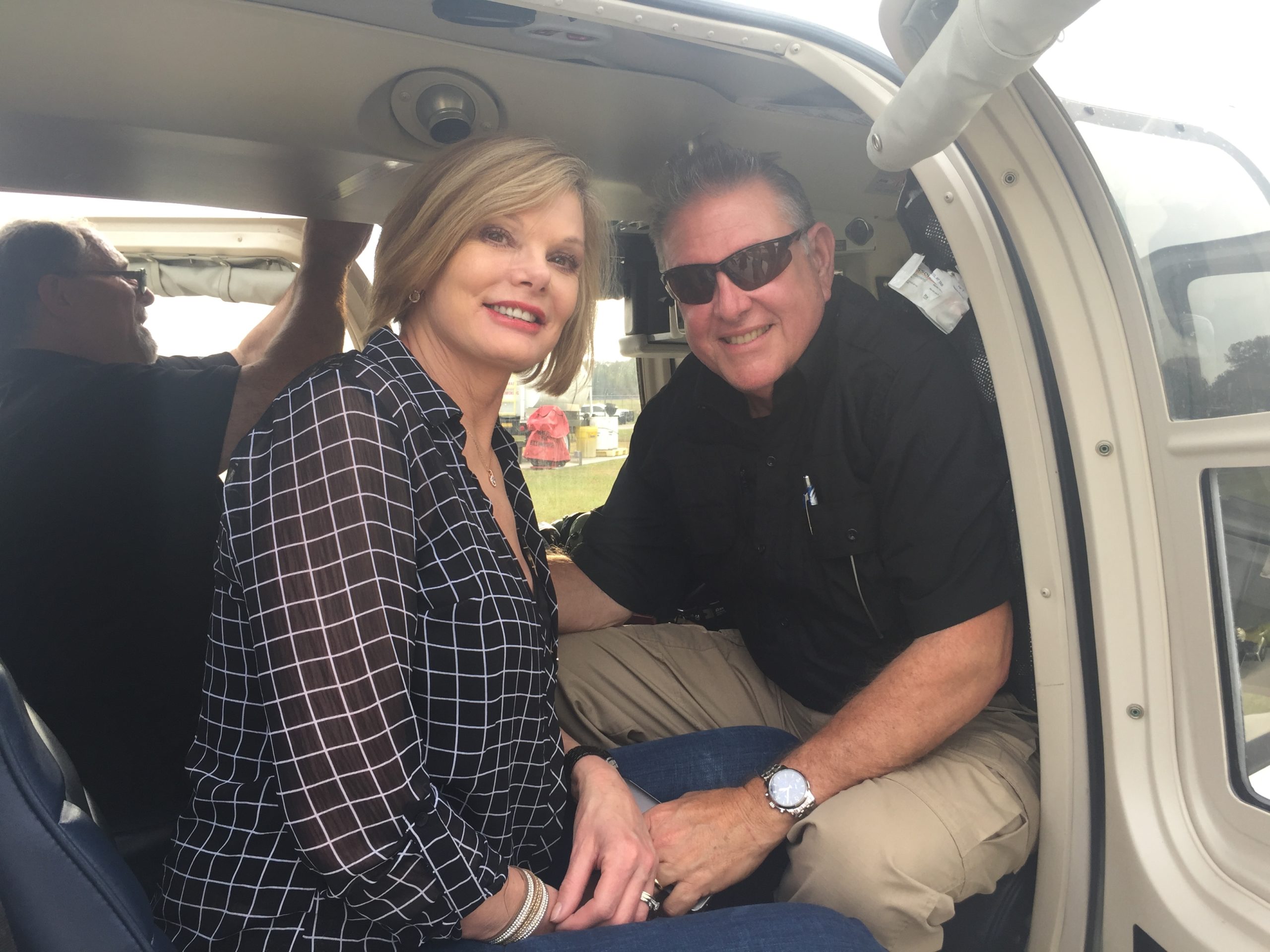 Karen Espinosa and husband in helicopter