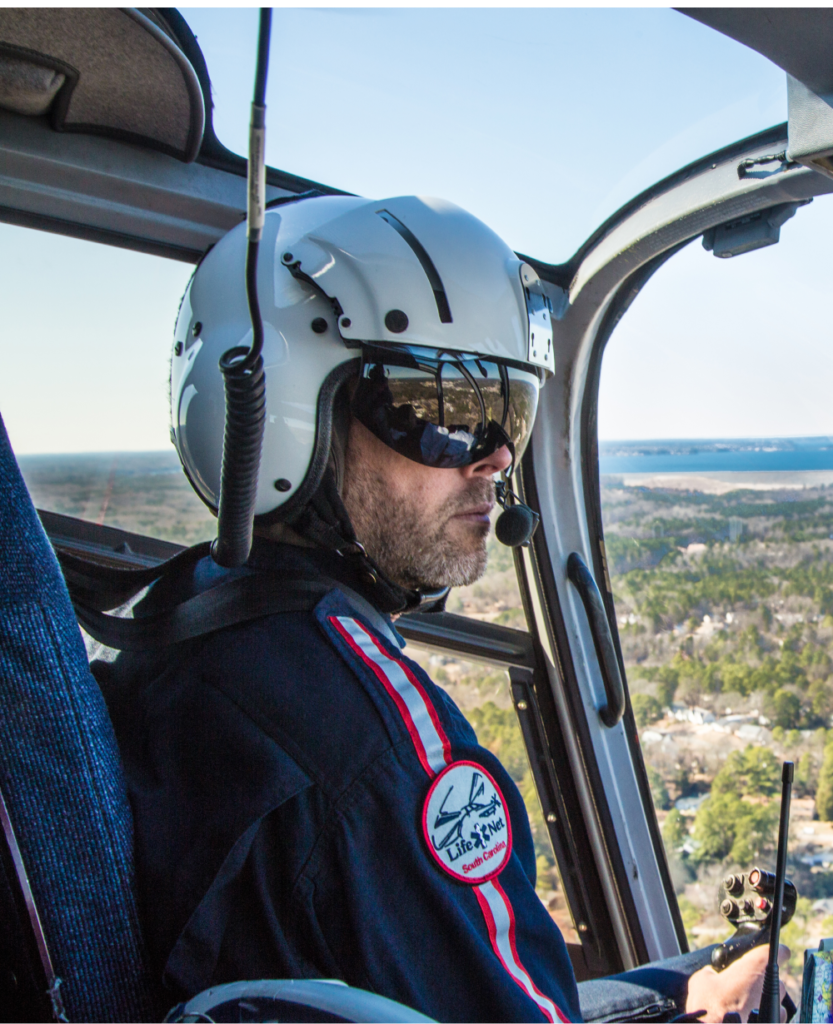 Pilot flying a helicopter.