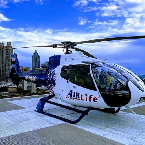 air medical helicopter on landing pad in city