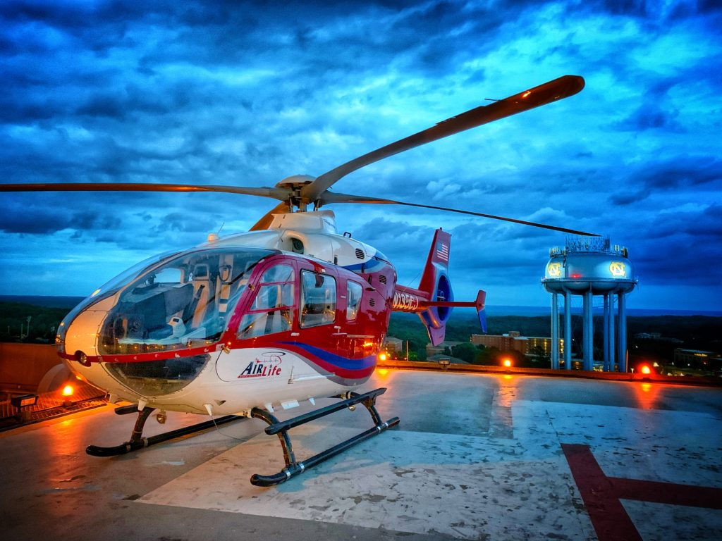 air medical helicopter on landing pad in city