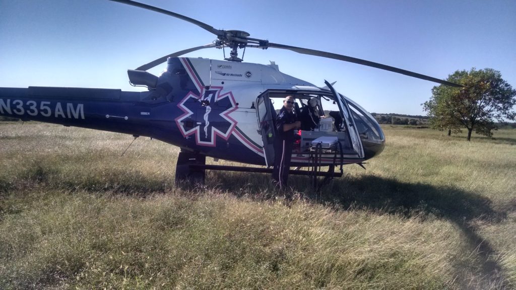 air medical helicopter landing in a field