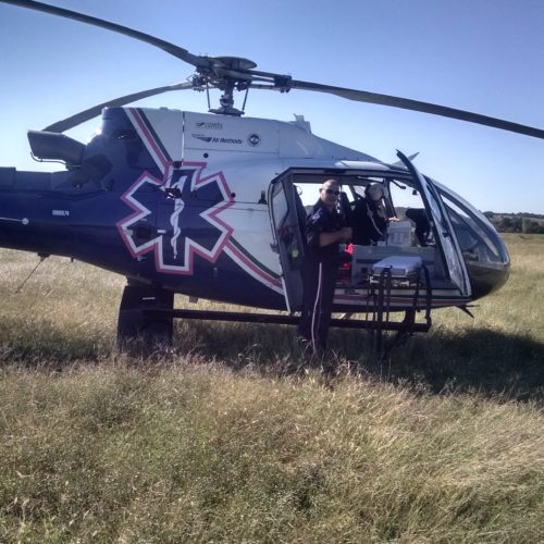 air medical helicopter landing in a field