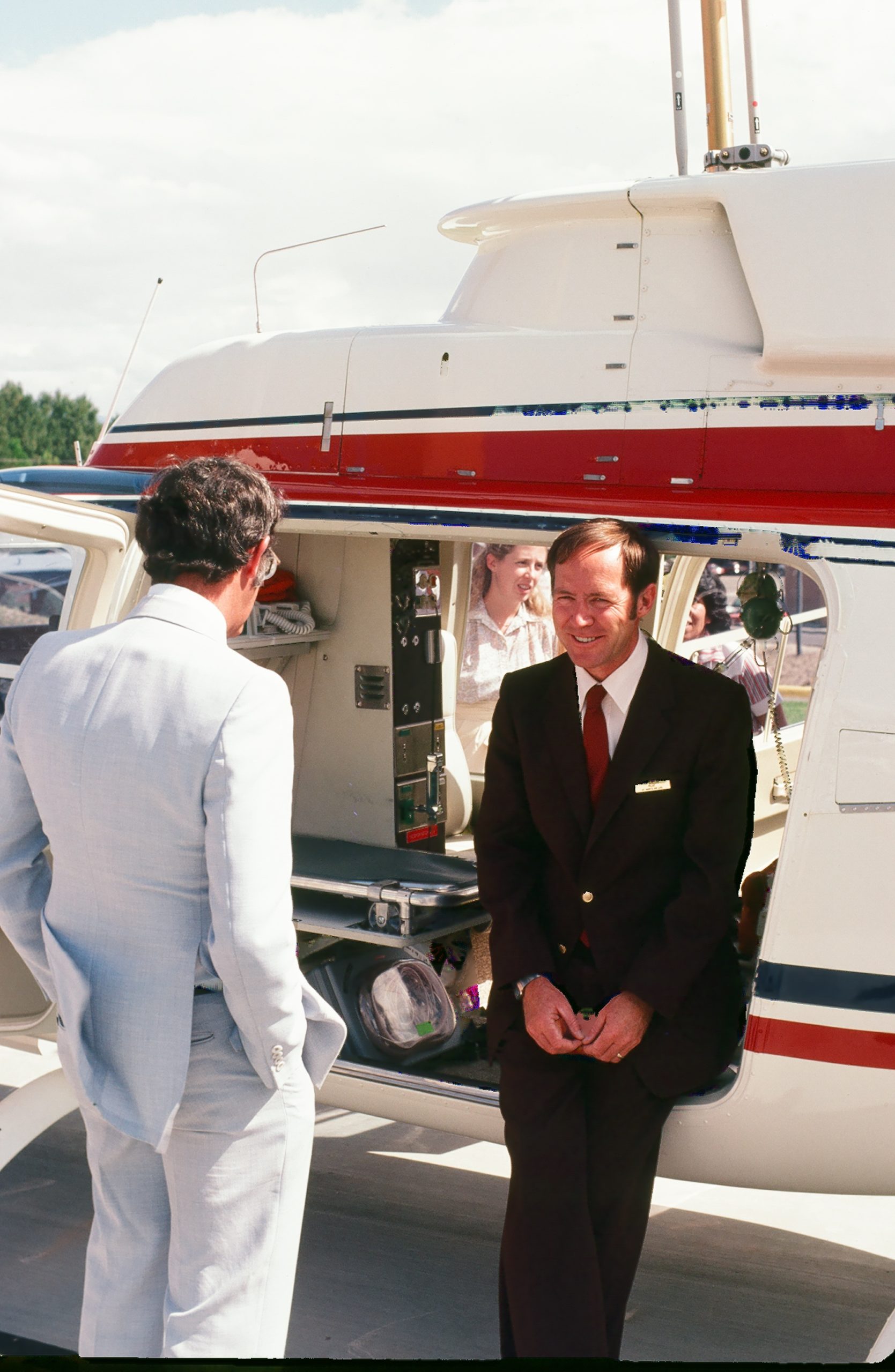 Roy Morgan sitting on helicopter.